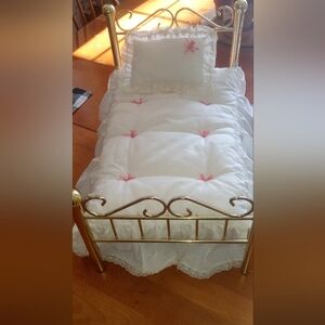 Charming Doll Bed with Gold Frame and White Bedding